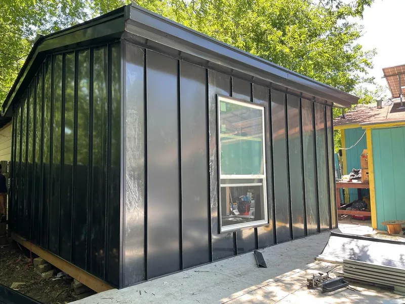 Black standing seam metal wall panels for Metal Roof Installation in Kennett