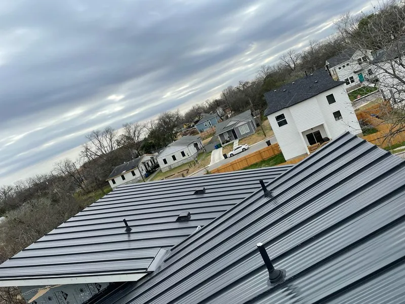 Standing seam metal roof panels with vents for Skylight Repair in Kennett